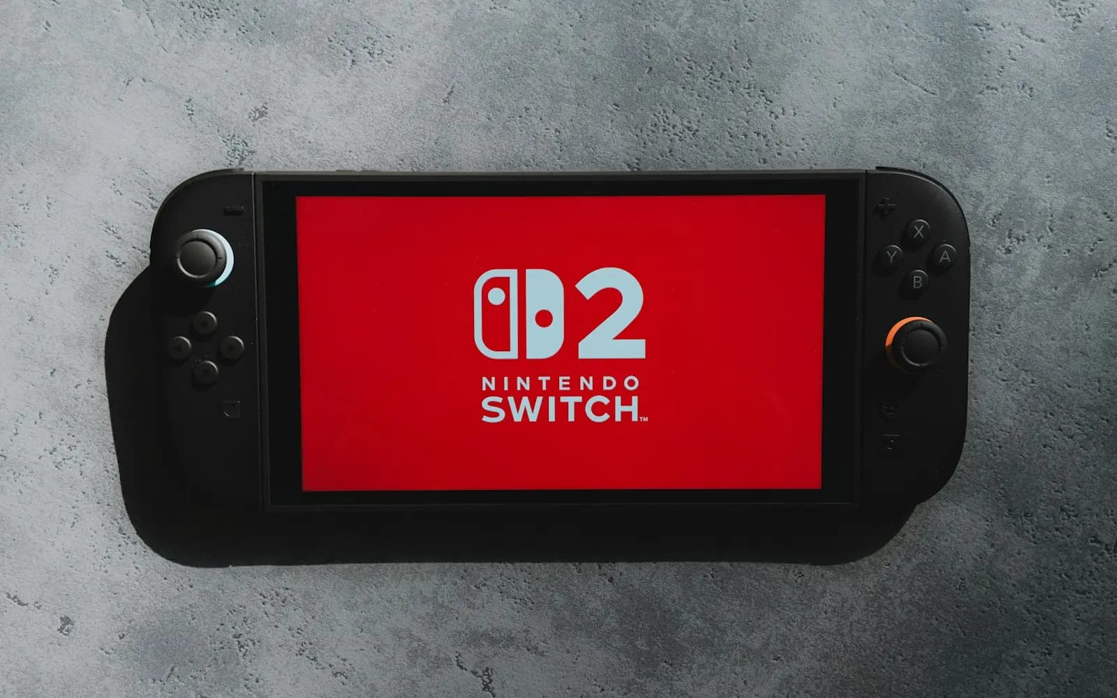 Консоль Nintendo Switch 2 с красным экраном